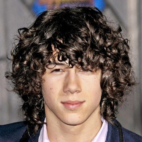 Nick Jonas Long Messy Curly Haircut