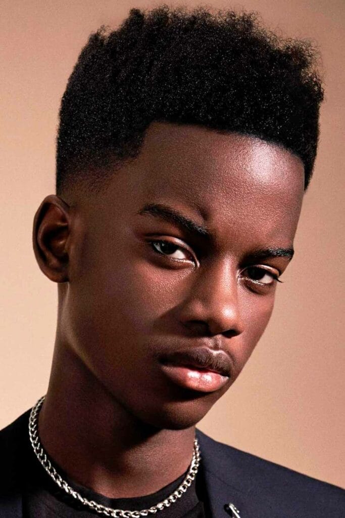 Black Boy Haircuts: 39 Trending Looks You Need to See 21 Fade with some volume on the top