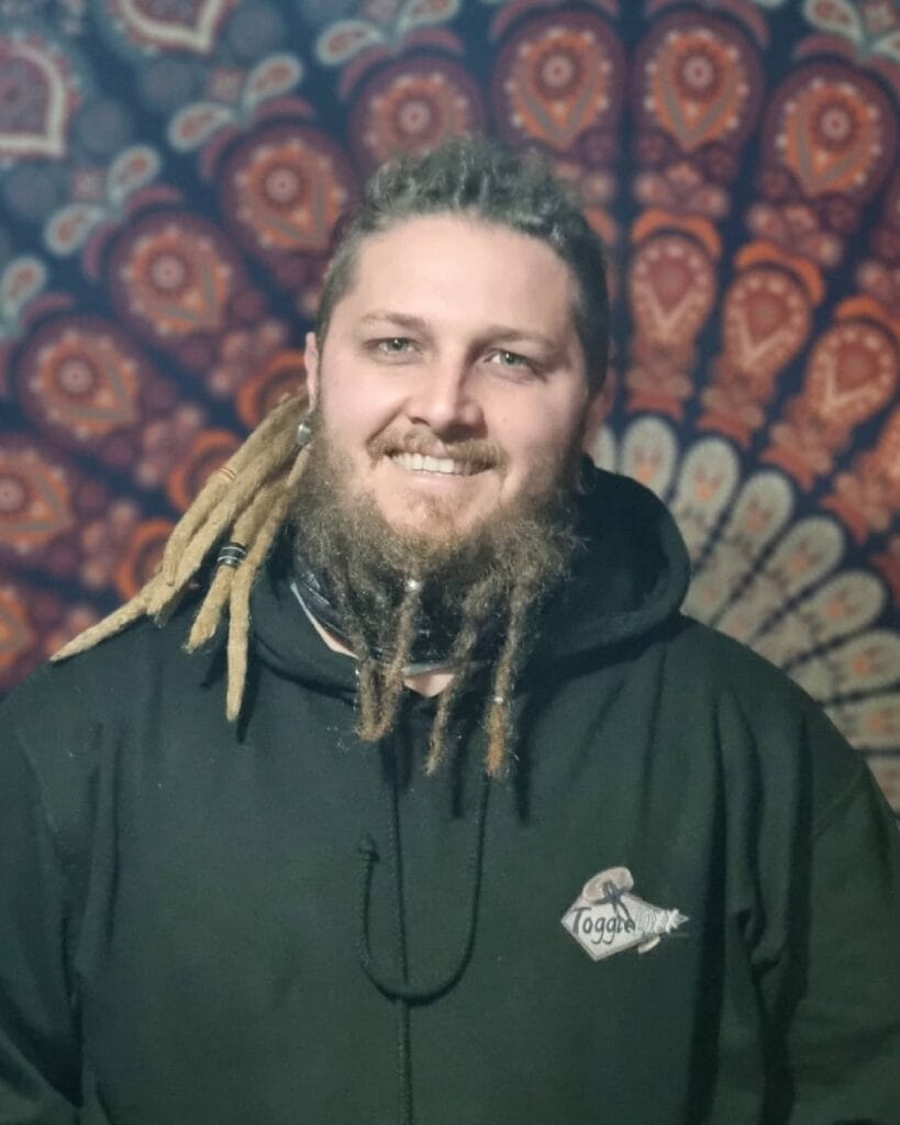 Beard Dreads: How to Get a Bold and Distinctive Look 8 Wrapped dreadlock beard ponytail