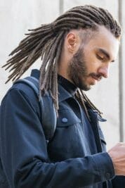 Mohawk Dreads: 41 Stunning Styles to Transform Your Look 4 Short sides With a Ponytail Mohawk (Men Mohawk Dreads)