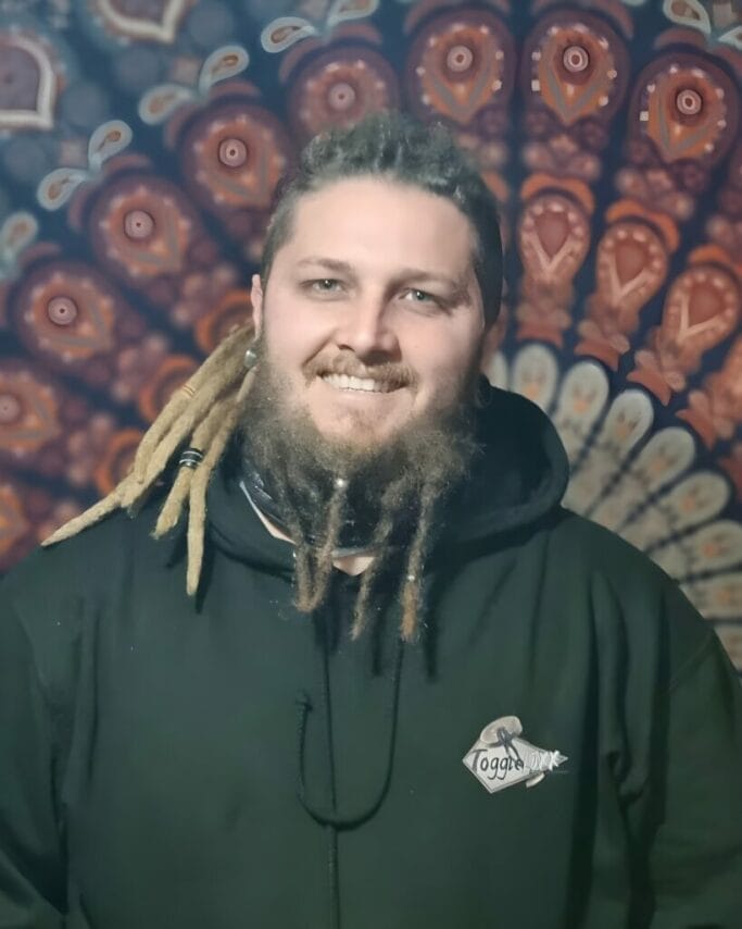 Beard Dreads: A Complete Guide to Unique Beard Styling 8 Wrapped dreadlock beard ponytail