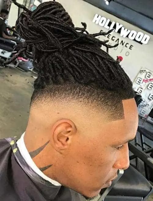 dreadlocks mohawk 9.jpg High Top Dreads: Elevate Your Look with Bold Hairstyles!