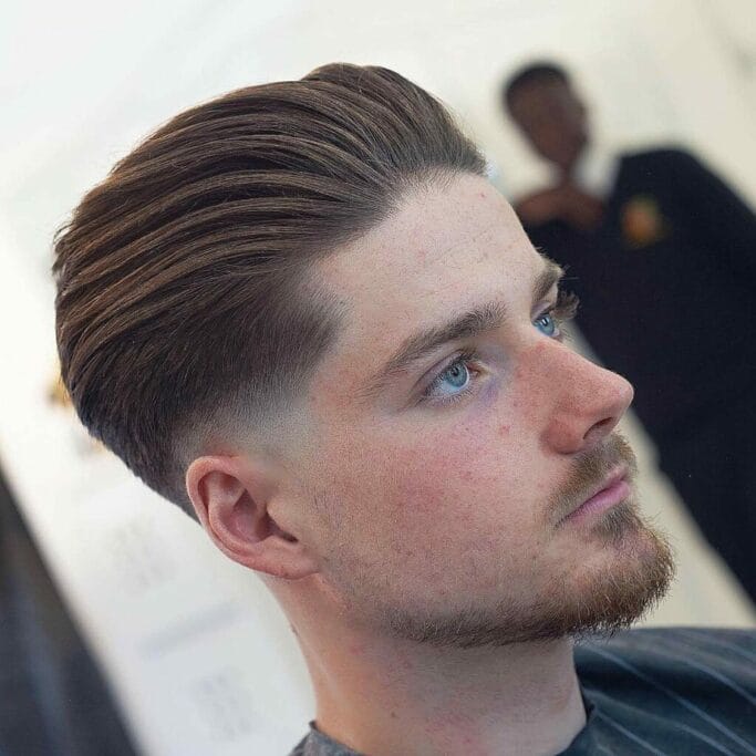slicked back pompadour with skin fade 30 Italian Men Hairstyles That Will Make You Stand Out