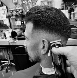 mid fade haircut with fringe