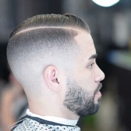 comb over mid fade haircut