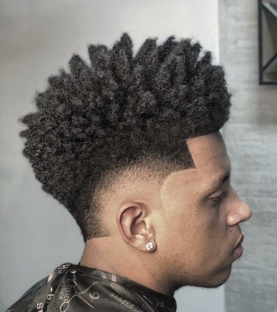 29 Faux Hawk Haircuts That Will Turn Heads Everywhere You Go 24 Afro Faux Hawk 8 29 Faux Hawk Haircuts That Will Turn Heads Everywhere You Go