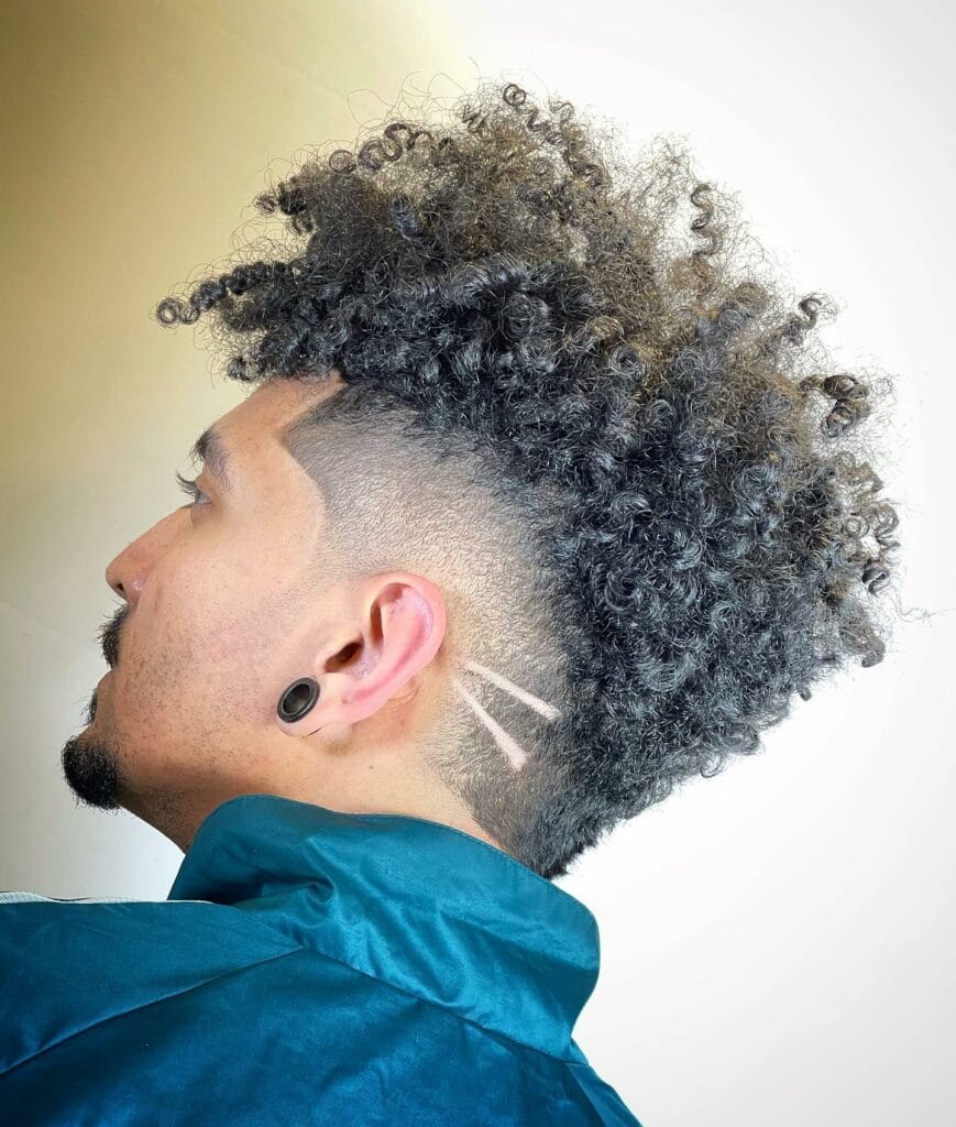 29 Faux Hawk Haircuts That Will Turn Heads Everywhere You Go 28 Disconnected Undercut Faux Hawk