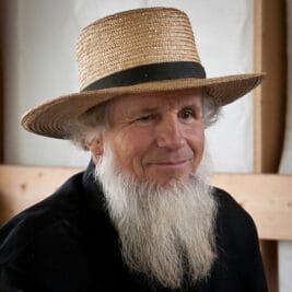 Why do Amish men grow beards like this?