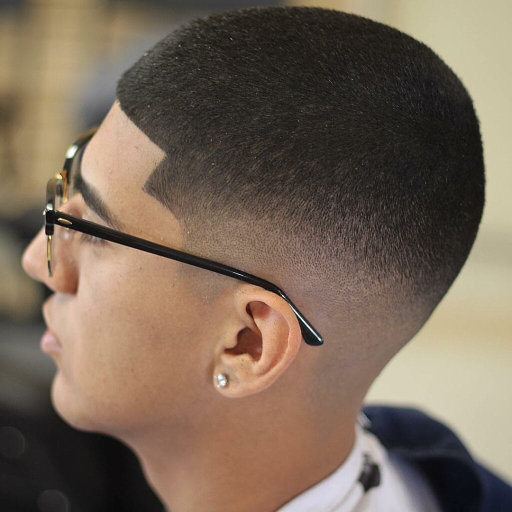 Mid Fade Haircuts That Will Make You Stand Out In a Crowd 11 Buzz Cut With Fade Haircut