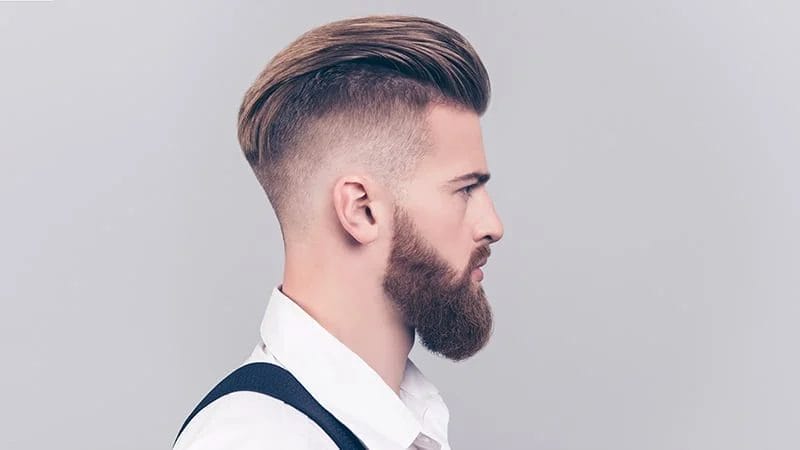 Skin Fade 33 Slicked Back Haircut for a Sleek and Youthful Appearance