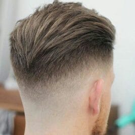 undercut 33 Slicked Back Haircut for a Sleek and Youthful Appearance