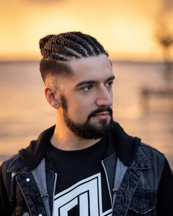 Ultimate Guide To Man Bun Hairstyle 18 braided bunLeonardo DiCaprio