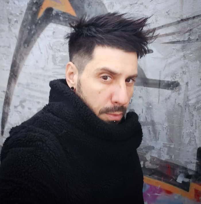 The Disconnected Undercut: A Stylish Leap Beyond Tradition 14 Undercut with Messy Top