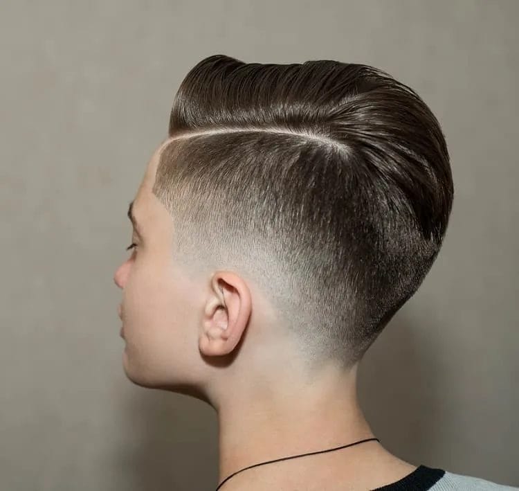 The Sophisticated Wavy Comb Over Fade Boy’s Haircut