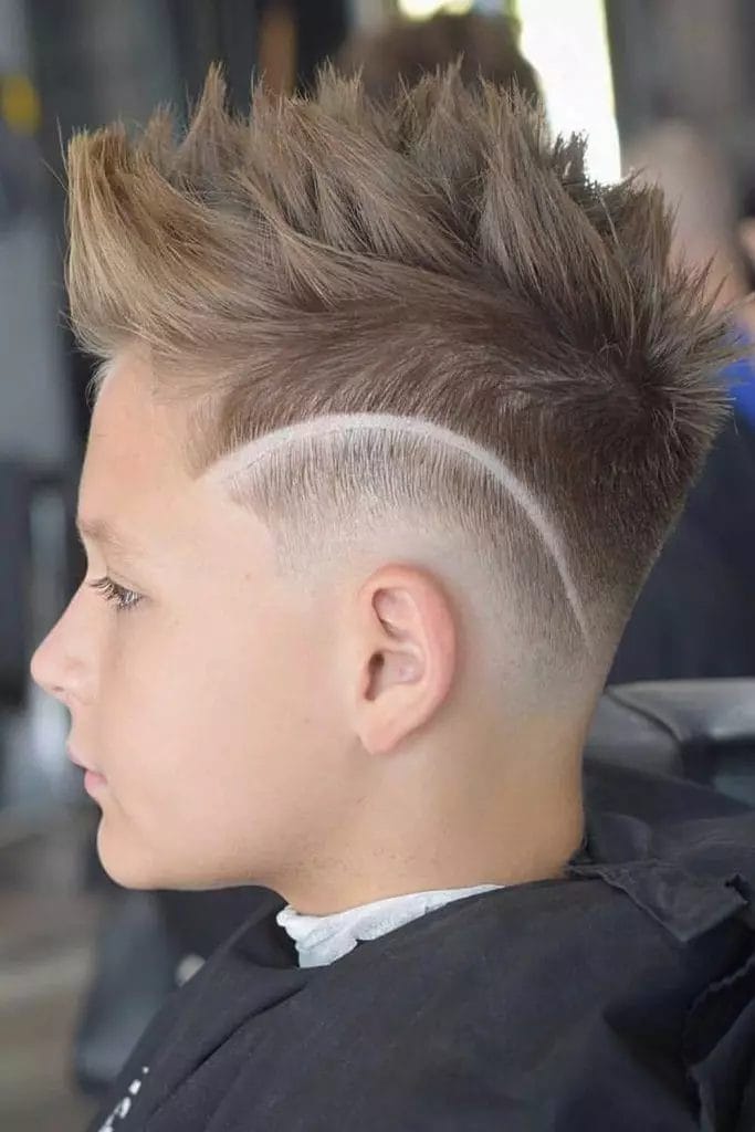 The Modern Undercut Haircut For Boys With A Mid Bald Fade