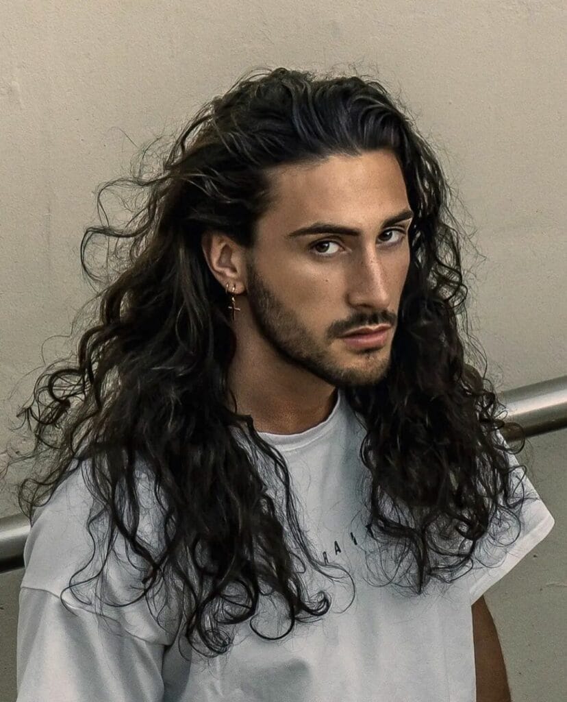 Locks That Rock: 25 Long Hairstyles for Men to Turn Heads 24 The Layered Waves