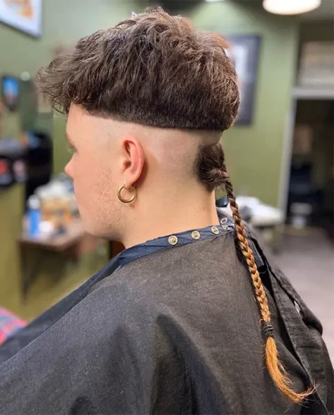 Rat Tail Hairstyles for Men: Bold & Daring Hairstyles Revival 14 Mohawk with Braided Rat Tail