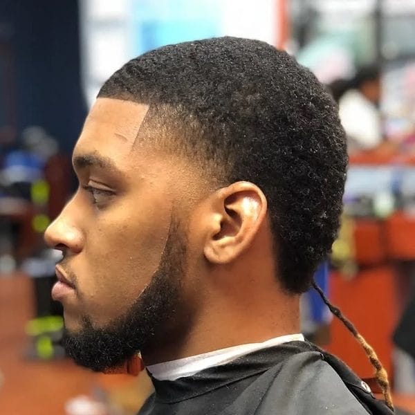 Rat Tail Hairstyles for Men: Bold & Daring Hairstyles Revival 26 Chignon Rat Tail Hairstyle