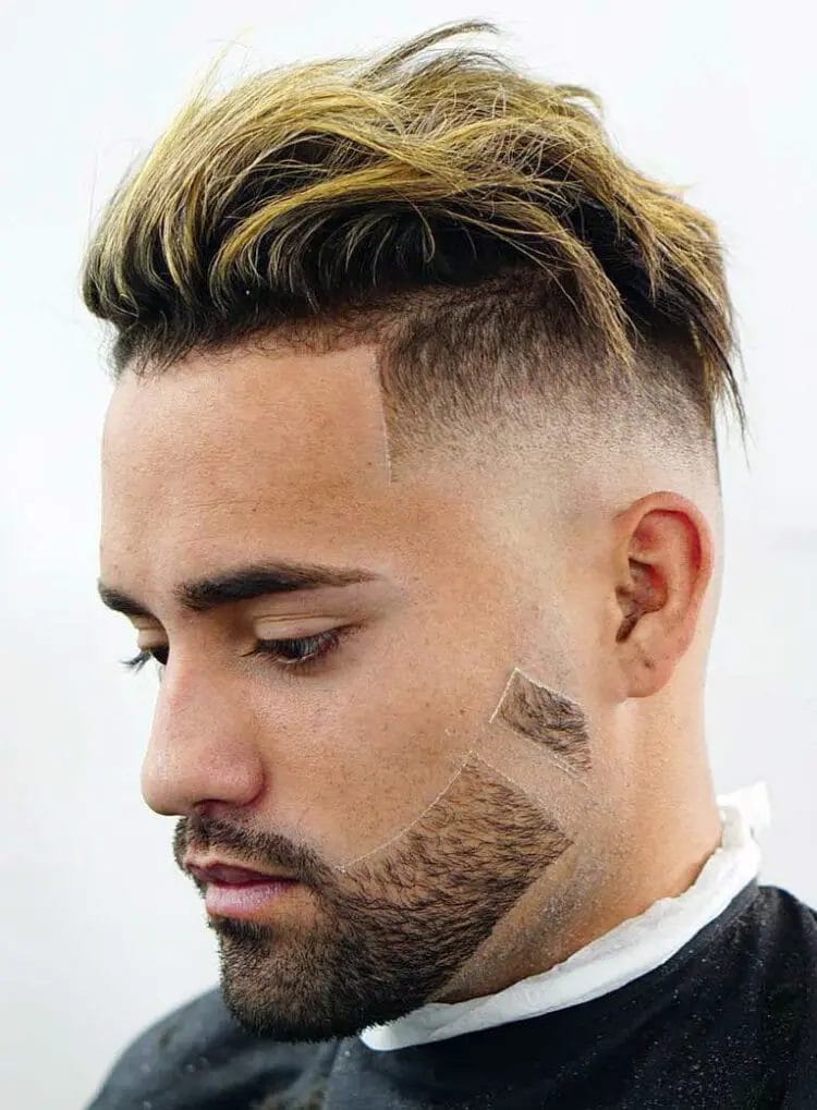 Low Fade with Styled Medium Top: Fresh, Modern, and Edgy