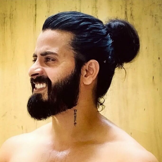 Best men's hairstyles for oval faces. A complete guide. 15 Man Bun for Oval Faces