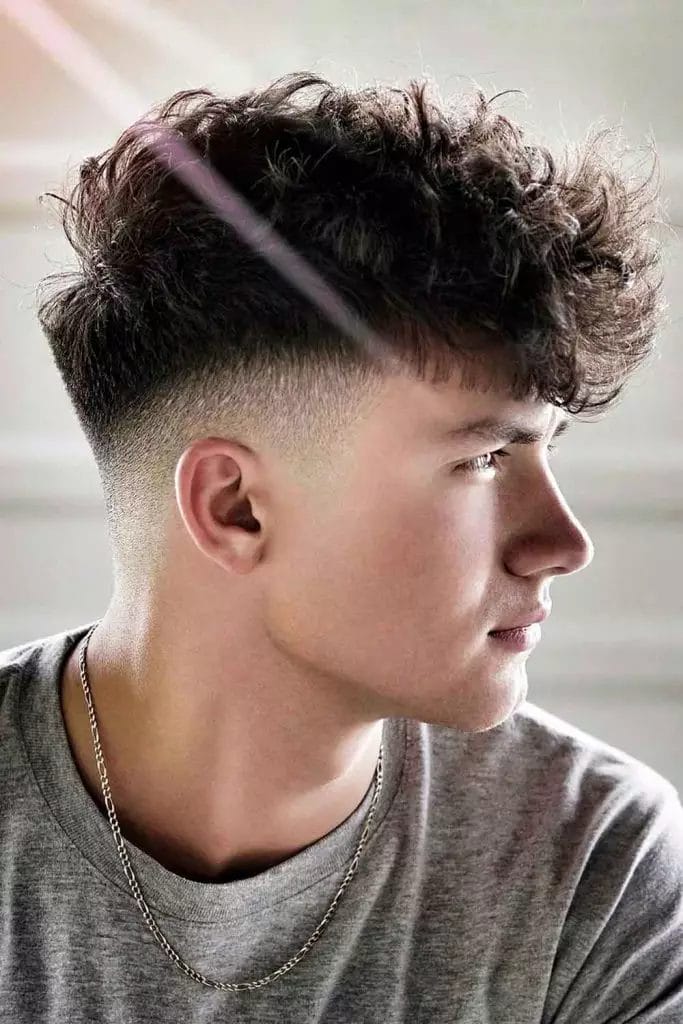 best curly hairstyles for men fluffy mid bald fade 683x1024 1