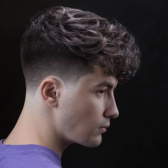 The Disconnected Undercut: A Stylish Leap Beyond Tradition 23 low fadeUndercut with Mohawk not Mohawk